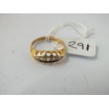 A 5 stone gypsy set ring, hallmarked B'ham 1908 in 18ct gold - size M - 2.8gms