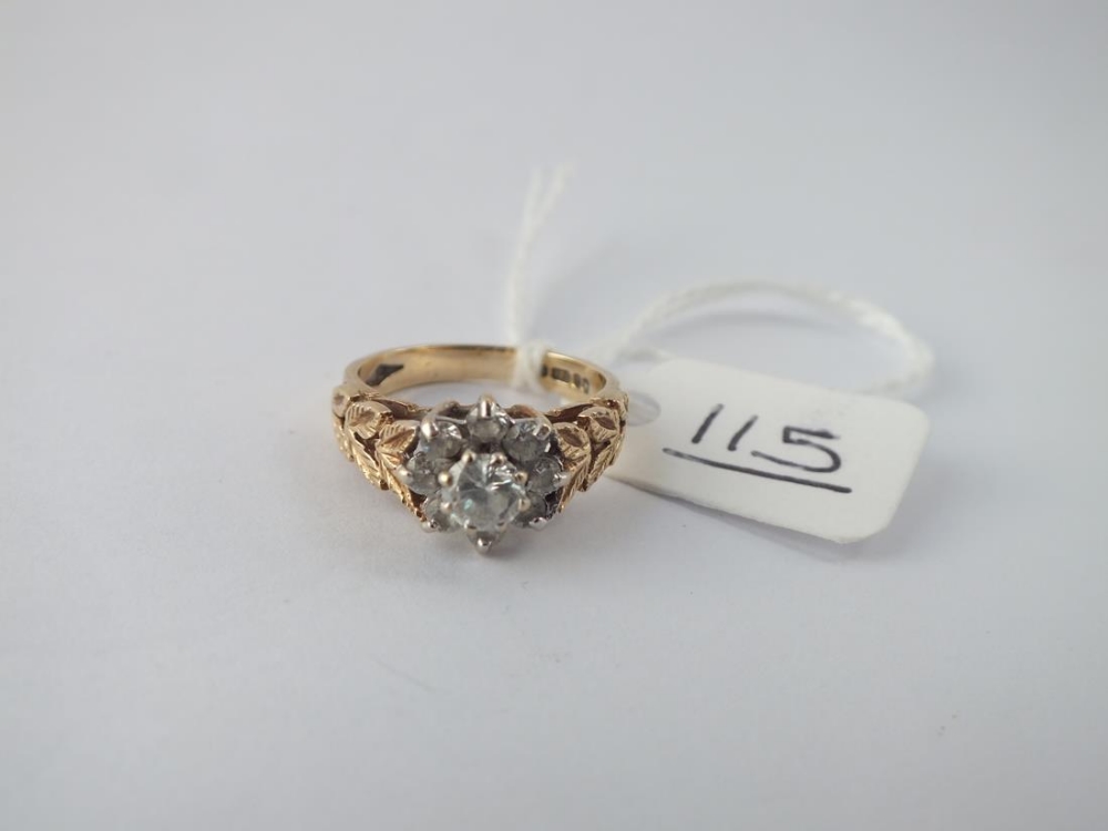 A cluster dress ring in 9ct - size J - 3.2gms