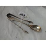 An Irish egg spoon - 1878 and a pair of Dublin tongs - 1901