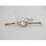 An antique moonstone bar brooch set in gold - 4.8gms