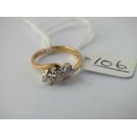 A 3 STONE DIAMOND TWIST RING SET IN 18CT GOLD - size M - 3.2gms