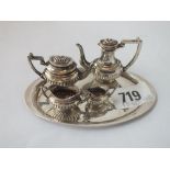 A miniature four-piece tea set on tray - 4.25" wide