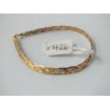A two-colour flat link gold bracelet - 2gms