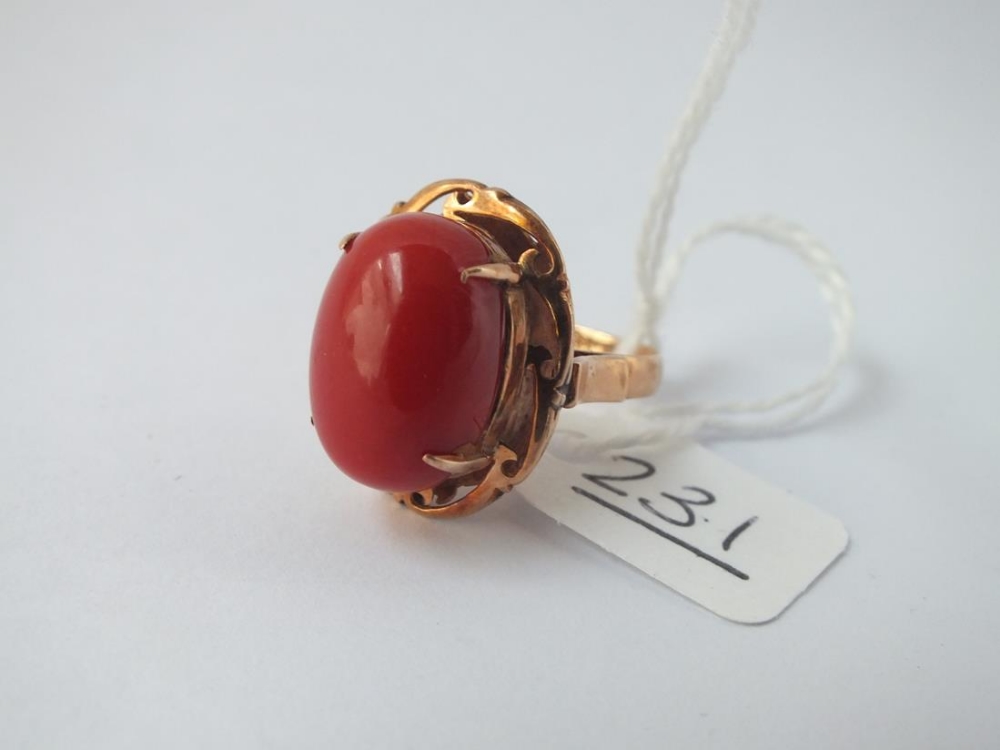 A orange stone dress ring in 14ct gold - size N - 7.4gms