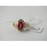 A pink & white CZ ring in 9ct - size N - 4.1gms