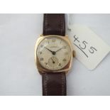 A gents wrist watch by FILLANS with seconds dial set in 9ct