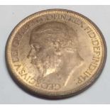 1925 halfpenny. Modified effigy. S4057. Scarce type. Almost mint