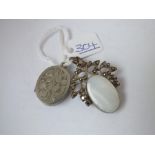 An oval pendant locket & marcasite stone set pendant