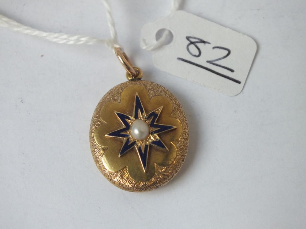 An antique enamel & pearl locket back pendant in 15ct gold