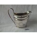A helmet shaped Georgian cream jug with reeded rims - London 1900 by GB - 137gms