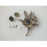 A silver and paste brooch and a pair of earrings