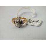 A diamond cluster ring in 18ct gold - size I - 3.8gms