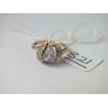A moonstone & diamond ring in 9ct - size H - 2.3gms