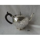 A Victorian bullet-shaped teapot with half-fluted decoration - London 1886 by CS HARRIS - 445gms