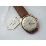 A GENTS WRIST WATCH BY WINEGARTENS LTD WITH SECONDS DIAL IN 9CT & LEATHER STRAP