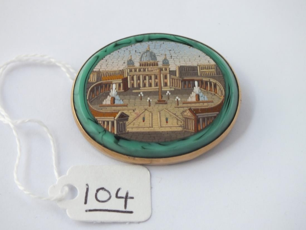 AN VICTORIAN OVAL FRAMED MIRCO MOSAIC BROOCH SET IN 9CT