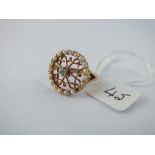 A fancy diamond & pearl circular ring -(1 pearl missing) set in 14ct gold - size O - 4.4gms