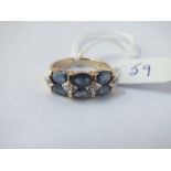 A 6 stone sapphire ring in 9ct - size N - 3.8gms