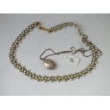 A pearl choker necklace together with oval locket pendant necklace