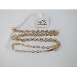 A fine oval link neck chain in 9ct - 1.3gms