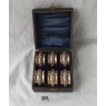 A set of six napkin rings with embossed girdles - B'ham 1901 by HW Ltd. Boxed