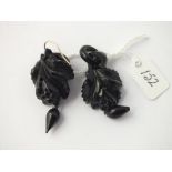 A pair of carved jet drop earrings - a/f