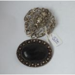 Two large silver brooches - (1 x 800)