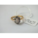 A opal & diamond cluster ring set in 18ct gold - size L - 3.8gms