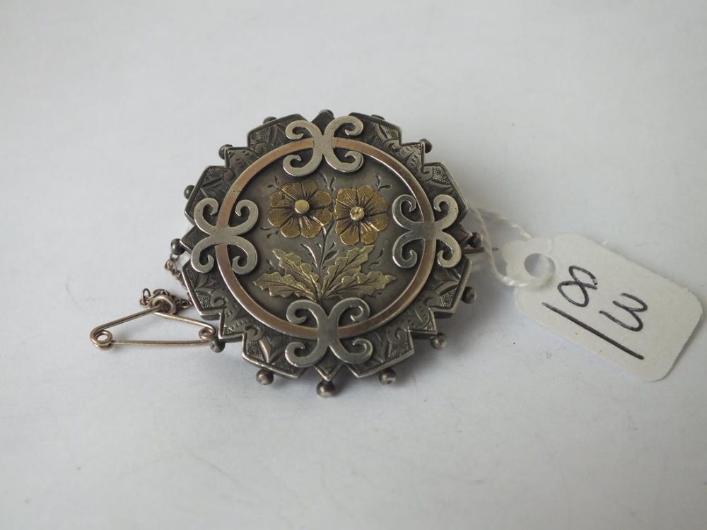 An antique gold on silver flowers brooch