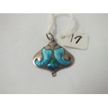 A silver and enamel fancy pendant