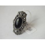 A large silver & marcasite onyx dress ring - size Q