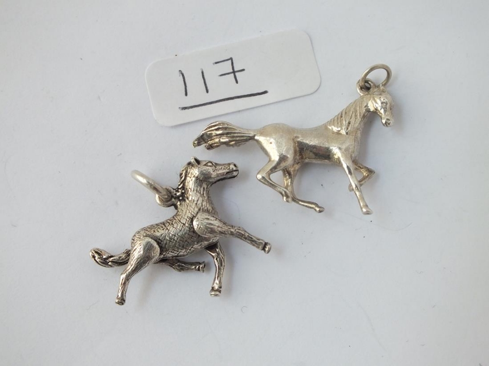 Two silver horse pendants