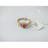 A orange stone & diamond ring in 9ct - size N - 2.4gms