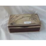 A Chinese silver cigarette box stamped "NAHS337 - Shanghai" - 6.5" wide