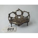 A miniature c19 sofa decorated with scroll work with import mark - 2.5" wide