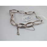 A silver fancy link bracelet