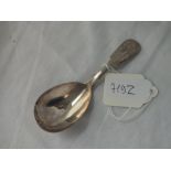 A Victorian fiddle pattern caddy spoon - London 1856 by HH