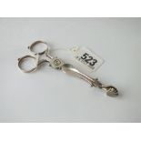 A pair of early George III sugar nips - scissor shaped - by TS