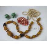 A bag of pearl & other necklaces, costume jewellery etc.
