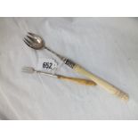 A bone-handled runcible spoon/fork and another