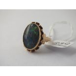 A opal doublet ring set in gold - size M - 4.6gms