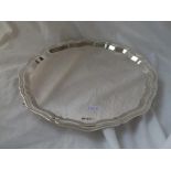 A GOOD PLAIN SHAPED CIRCULAR SALVER ON SCORE FEET - 11"Diam - 770gms