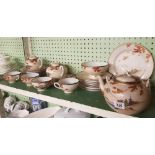 SHELF OF ORIENTAL TEA WARE