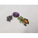 AN ENAMEL & PASTE TORTOISE BROOCH, ON AMETHYST COLOURED & SILVER BROOCH & ANOTHER