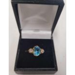 STUNNING 3 STONE BLUE TOPAZ & DIAMOND RING IN HIGH CARAT GOLD