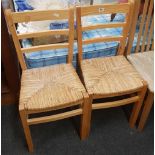 PAIR OF PINE STRUNG SEATED KITCHEN CHAIRS