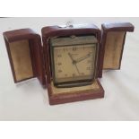 SMALL BRASS CASED SWIZA TRAVEL CLOCK IN CASE