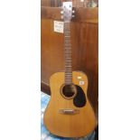 AN ENCORE ACOUSTIC GUITAR