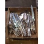 CARTON OF PLATED CUTLERY INCL: CARVING SET, SHARPENING STONES, LADLES & OTHER PLATED CUTLERY