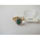 A emerald & diamond cluster ring in 18ct gold - size K - 3.1gms
